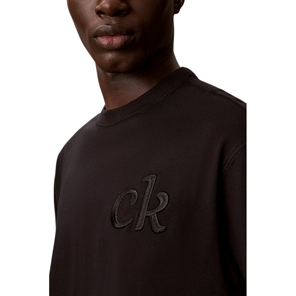 CALVIN KLEIN JEANS 16S AUG CALVIN KLN TRVL GRAPH T-SHIRT ΜΠΛΟΥΖΑ ΑΝΔΡΙΚΗ BLACK