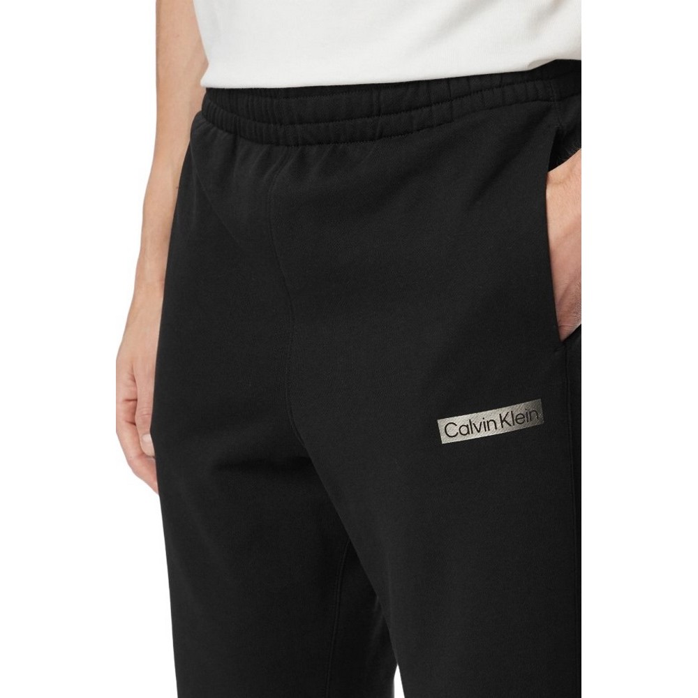 CALVIN KLEIN 350TERRY EU SP GRAPHIC JOGGER ΠΑΝΤΕΛΟΝΙ ΦΟΡΜΑ ΑΝΔΡΙΚΗ BLACK