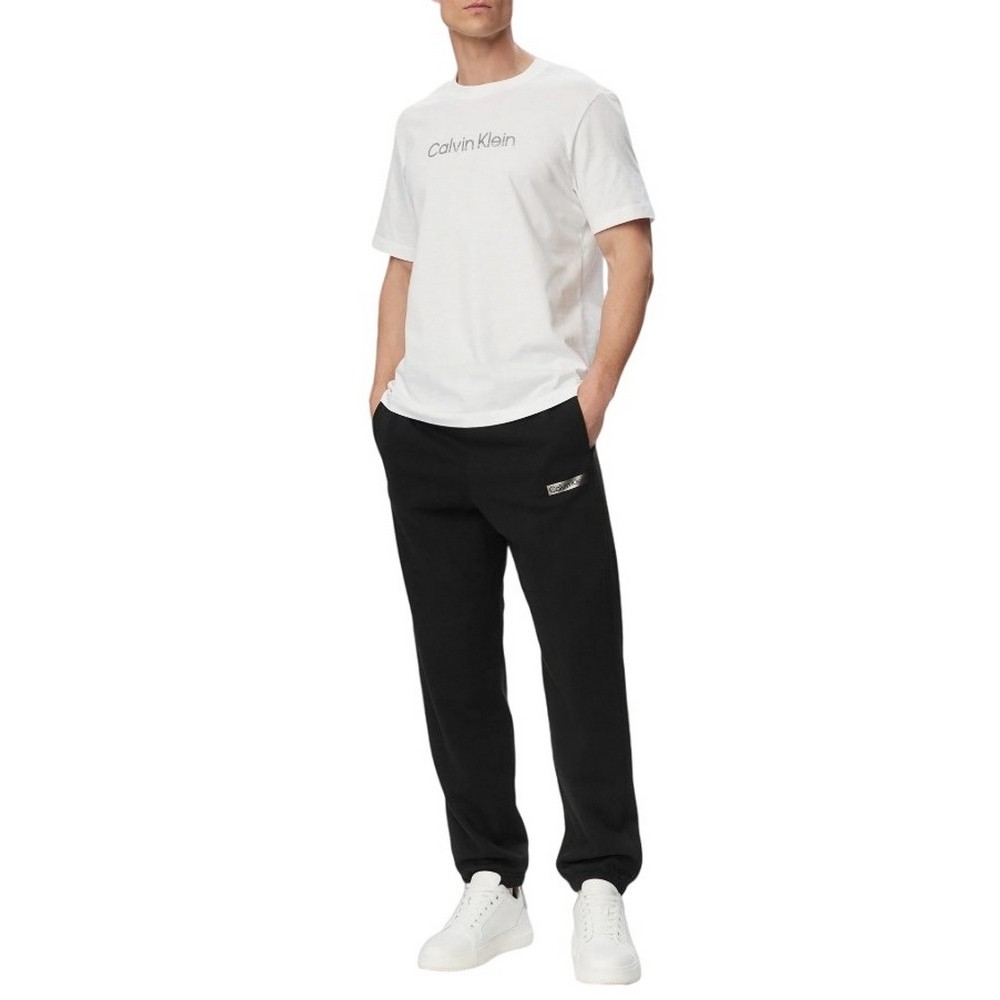 CALVIN KLEIN 350TERRY EU SP GRAPHIC JOGGER ΠΑΝΤΕΛΟΝΙ ΦΟΡΜΑ ΑΝΔΡΙΚΗ BLACK