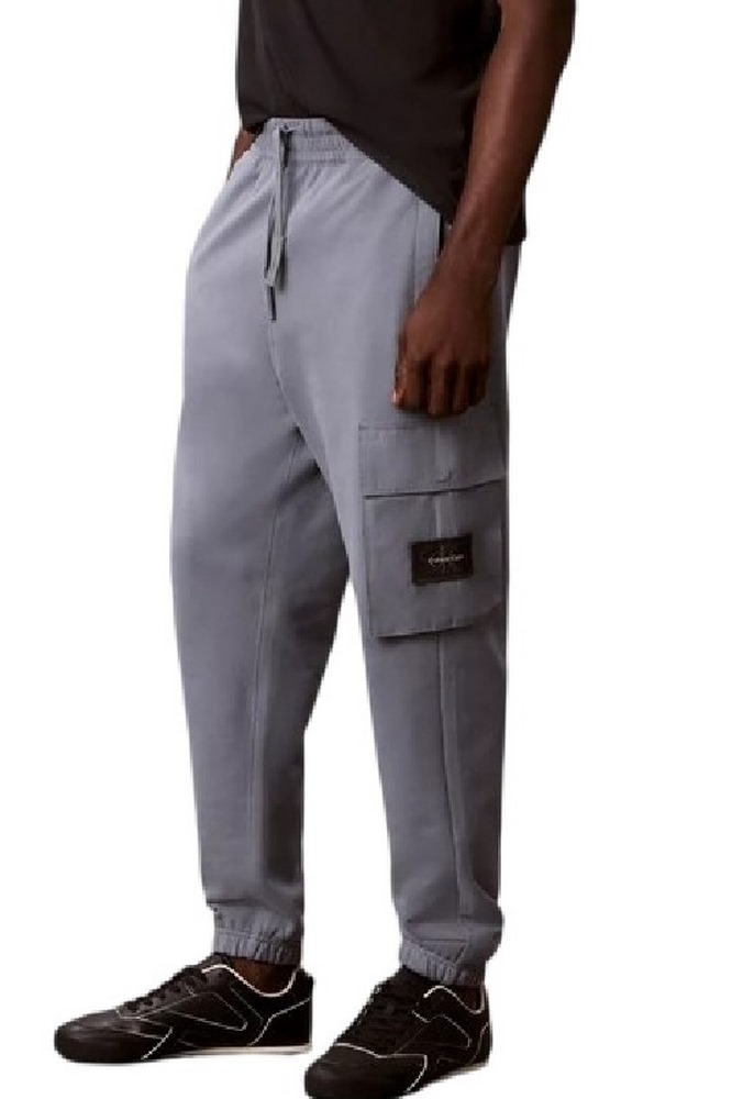 CALVIN KLEIN JEANS EU 350TERRY BADGE JOGGER ΦΟΡΜΑ ΠΑΝΤΕΛΟΝΙ ΑΝΔΡΙΚΟ STEEL GRAY