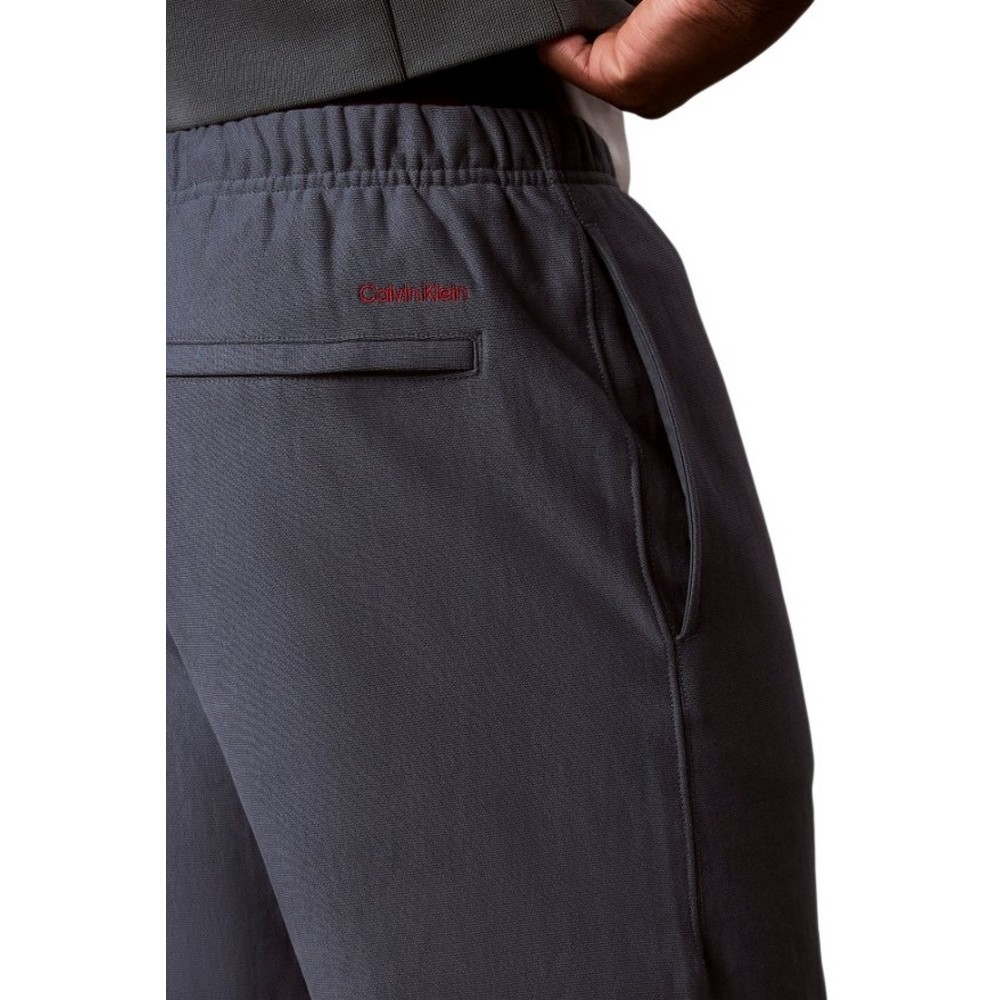 CALVIN KLEIN JEANS PREMIUM TERRY GRAPHIC JOGGER ΠΑΝΤΕΛΟΝΙ ΦΟΡΜΑ ΑΝΔΡΙΚΟ SLATE GRAY