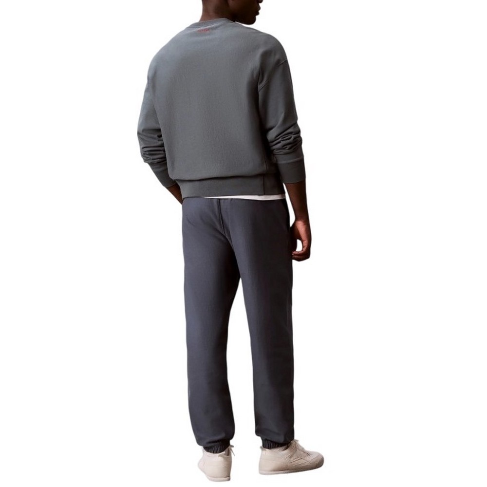 CALVIN KLEIN JEANS PREMIUM TERRY GRAPHIC JOGGER ΠΑΝΤΕΛΟΝΙ ΦΟΡΜΑ ΑΝΔΡΙΚΟ SLATE GRAY