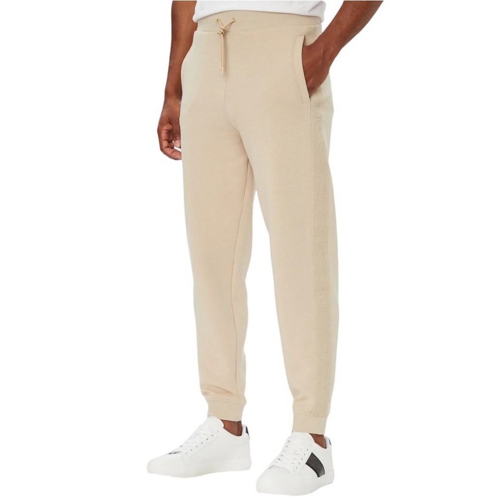 GUESS THOR CUFFED JOGGER ΦΟΡΜΑ ΠΑΝΤΕΛΟΝΙ ΑΝΔΡΙΚΟ BEIGE